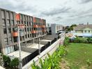 View from property overlooking neighboring buildings and green space