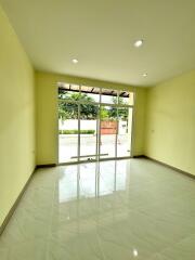 Bright and spacious living room with large windows