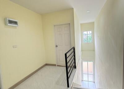 Bright hallway with staircase