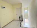 Bright hallway with staircase