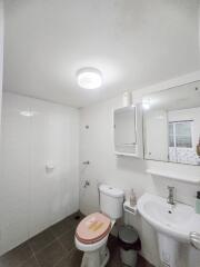 Modern bathroom with fixtures and mirror