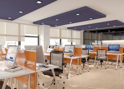 Modern office space with multiple desks and computers