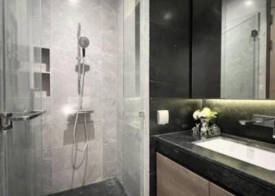 Modern bathroom with glass shower and vanity