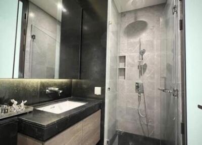 Modern bathroom with glass shower and vanity