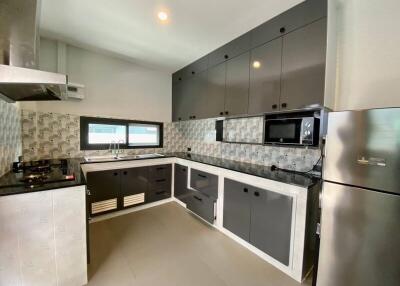 Modern kitchen with stainless steel appliances