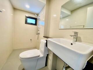 Modern bathroom with toilet and sink