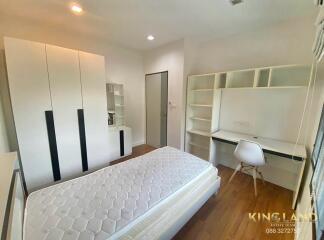 Modern bedroom with study desk and wardrobe