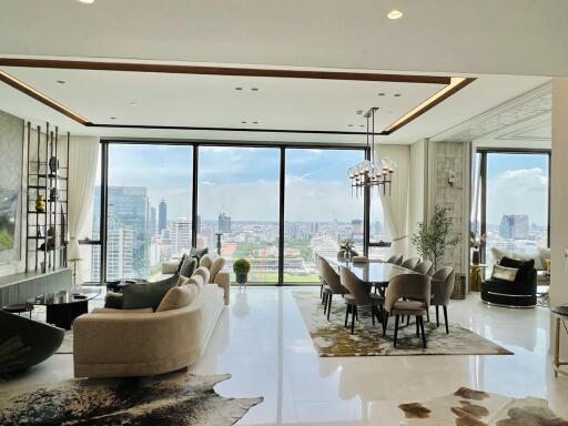 Spacious open-plan living and dining area with city views