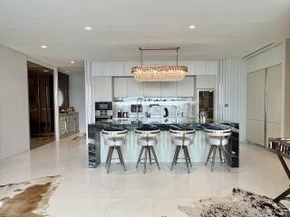 Modern kitchen with island and bar stools