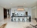 Modern kitchen with island and bar stools