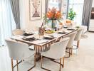 Elegant dining room with a modern table set and floral centerpiece