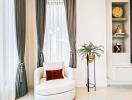 Modern living room with chair, plant, and decorative shelving