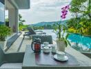 Outdoor patio with pool and mountain view