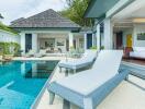 Outdoor pool area with lounge chairs and view of bedroom and living space