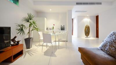 Modern living room with dining area and contemporary decor