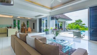 Modern living area with open layout and pool view