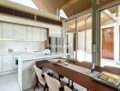 Modern kitchen and dining area with large windows