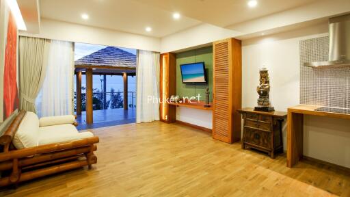 Spacious living room with wooden floor and modern decor