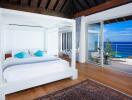 Spacious bedroom with ocean view and modern decor