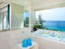 Luxurious bathroom with ocean view and a jacuzzi