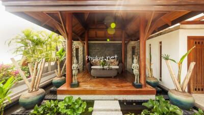 Outdoor veranda with seating area and plants