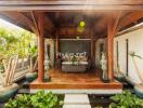 Outdoor veranda with seating area and plants