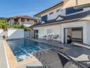 Outdoor view of a house with a swimming pool