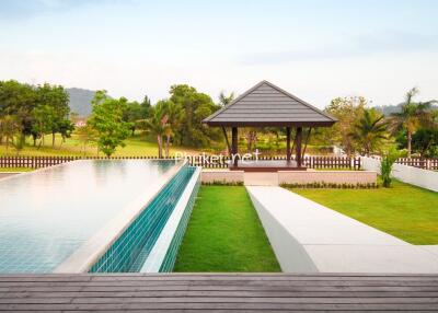 Beautiful outdoor area with a pool and pavilion