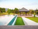 Beautiful outdoor area with a pool and pavilion