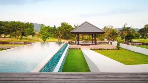 Beautiful outdoor area with a pool and pavilion