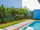 Outdoor area with pool and garden