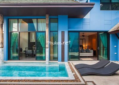 Outdoor pool area with view into living space and bedroom