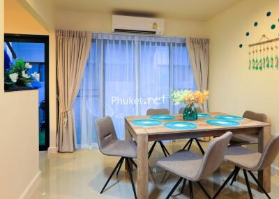 Modern dining area with table set for four