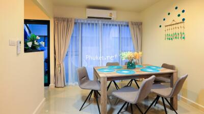 Modern dining area with table set for four