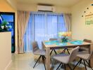 Modern dining area with table set for four