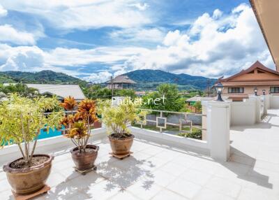 Spacious balcony with scenic mountain view