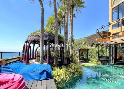 Luxurious outdoor space with pool and sea view