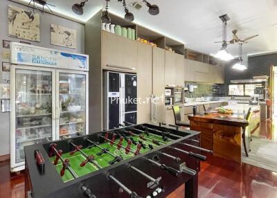 Modern kitchen with foosball table