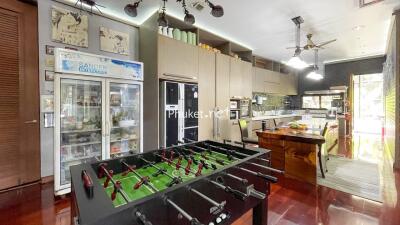 Modern kitchen with foosball table