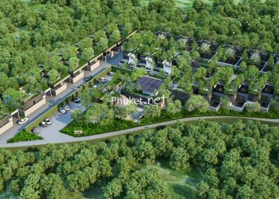 Aerial view of a residential development surrounded by greenery