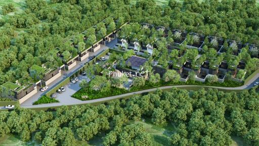 Aerial view of a residential development surrounded by greenery