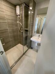 Modern bathroom with glass-enclosed shower