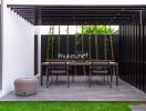 Modern outdoor dining space with pergola