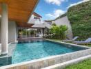 Outdoor swimming pool and garden area of a modern home