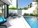 Modern outdoor area with swimming pool and seating