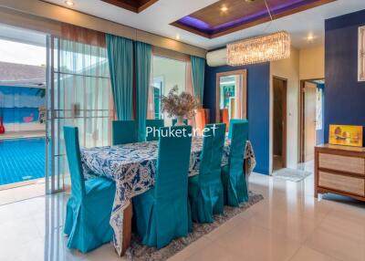 Dining room with a view of the swimming pool