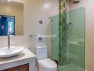 Modern bathroom with glass shower door and sink