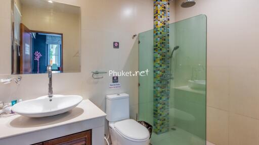 Modern bathroom with glass shower door and sink