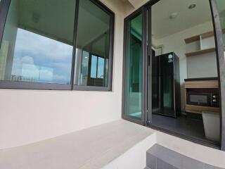 Modern kitchen with balcony view