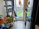 Narrow kitchen with balcony view